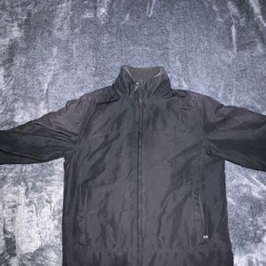L Weather proof double zipper rain coat
